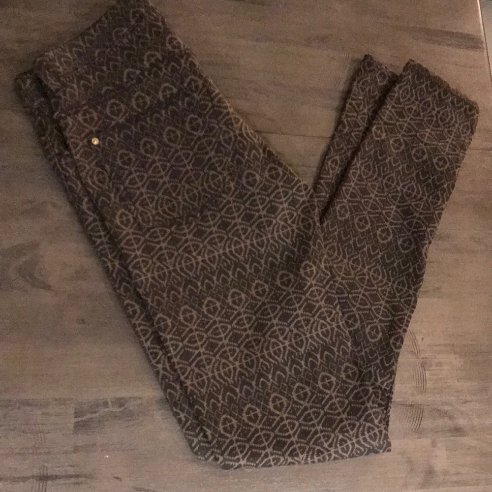 Black and tan patterned skinny jeans